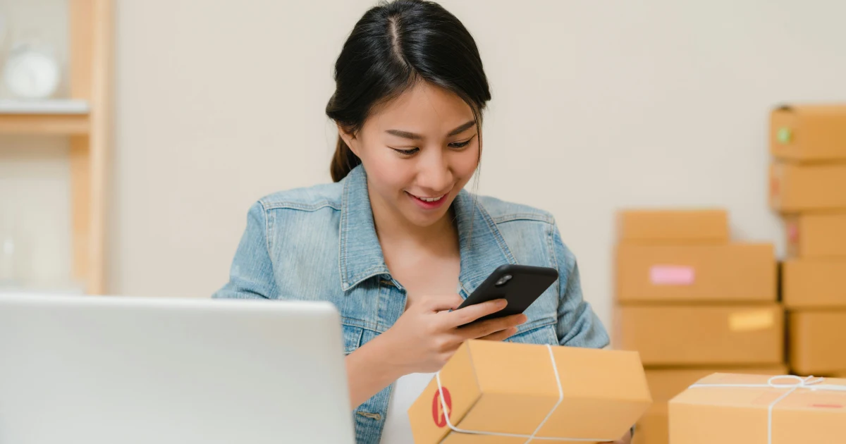 Seller scanning a package barcode before fulfilling an order